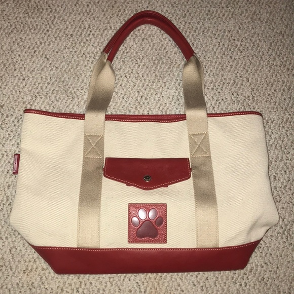 Dooney & Bourke Handbags - Dooney & Bourke Paw Print Hand Bag